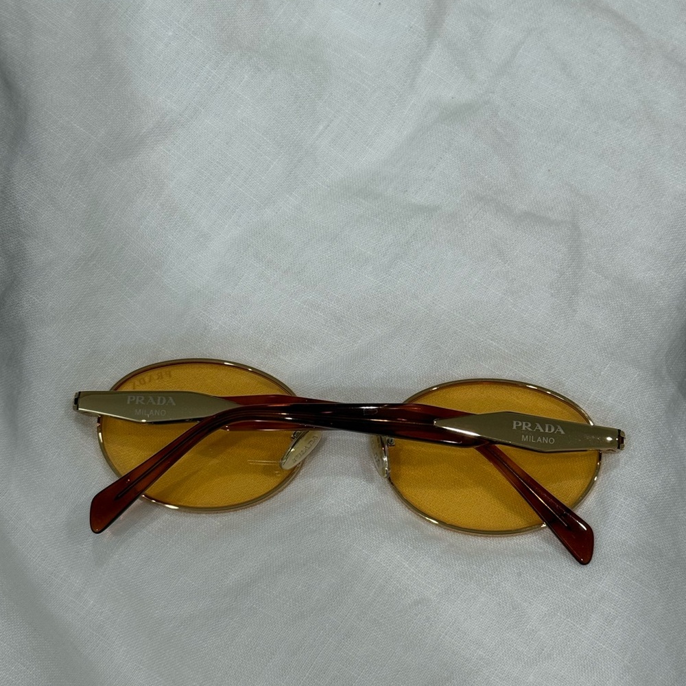 Prada Yellow Lens Oval Sunglasses with Tortoiseshell Arms